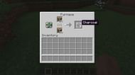 Smelting wood logs at a furnace in Minecraft for charcoal. (Image via Minecraft)